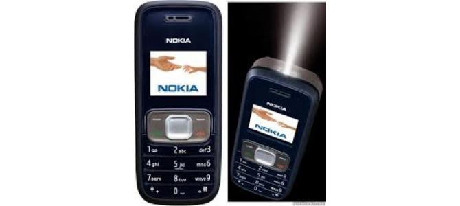 Vand telefon Nokia 1208.